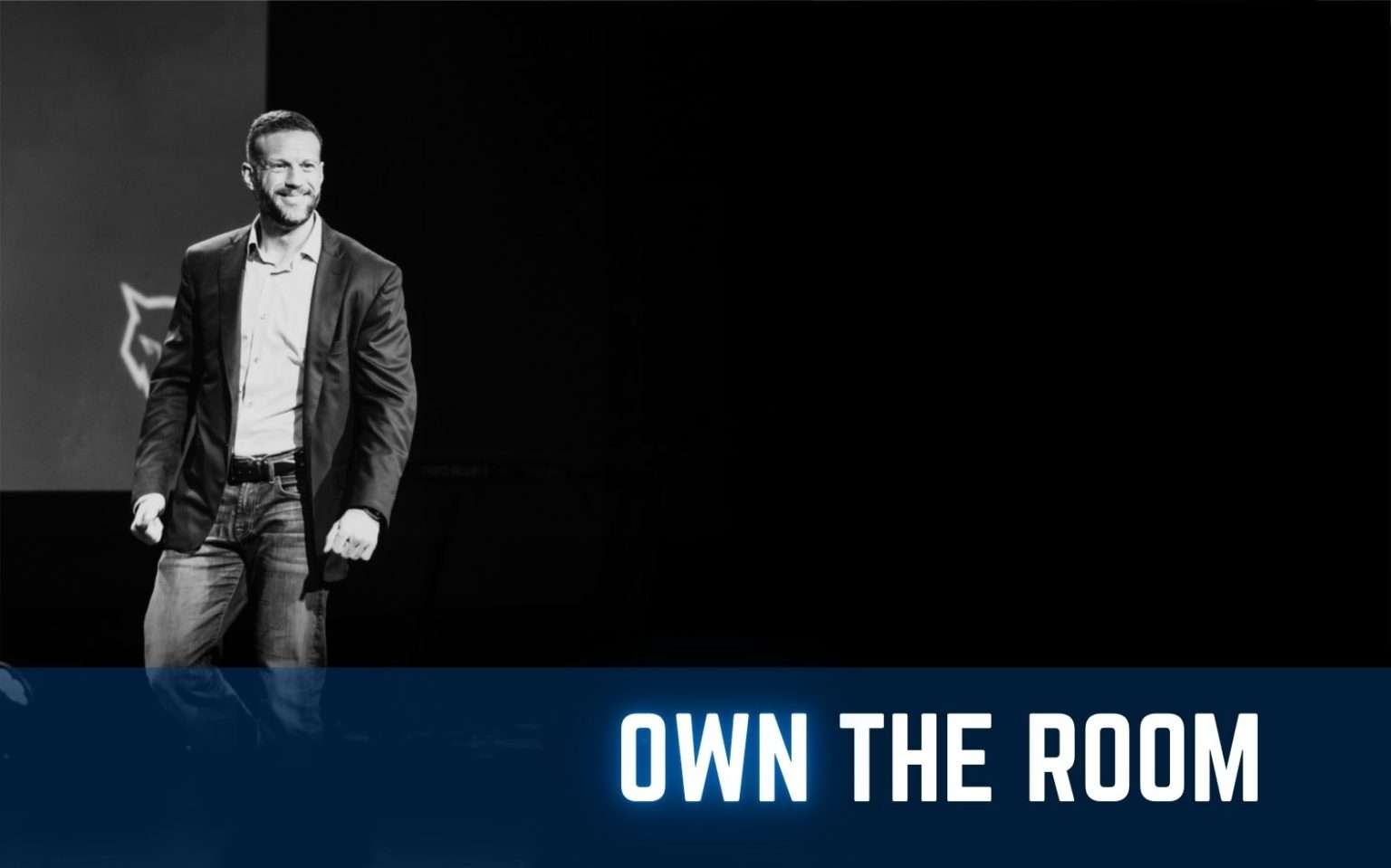 Sean Barnes on stage owning the room during an executive presentation skills course in Houston.