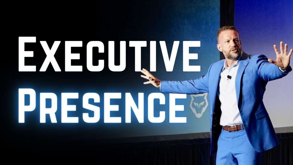 Sean Barnes speaking on stage about executive presence for senior leaders